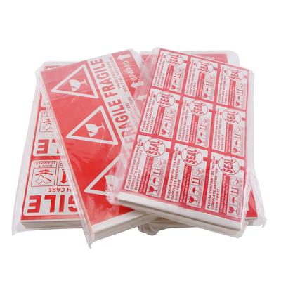 China Custom High Quality Strong Adhesive Paper Packaging Warning Risk Sticker Goods Candle Dangerous Caution Label for sale