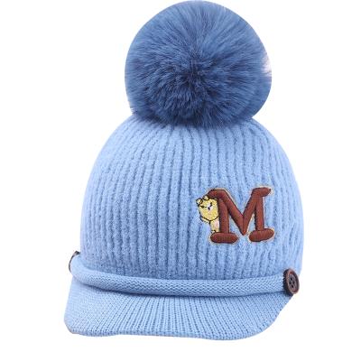 China Low point goods autumn and winter children warm large thickened knitting pompom peaked hat for sale