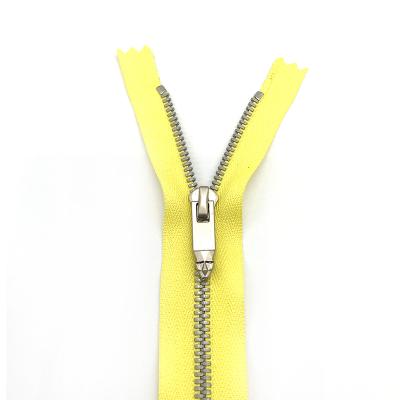 China The metal zipper is very good quality #3 end teeth metal zipper shoes fashionable yellow narrow zipper for sale