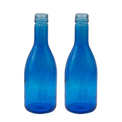 China Beverage 350ml Blue Glass Recycled Champagne Wine Bottle Wine Bottle Beverage Beer Cocktail Glass Bottle for sale