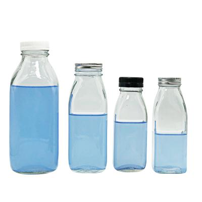 China Beverage 250ml 300ml 500ml 750ml 1L Clear Juice Bottle Glass Milk Bottle With Screw Cap Glass Bottle for sale