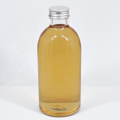 China Healthy Beverage Round 300ml Glass Bottle Juice Bottle Clear Water Bottle With Metal Cap for sale