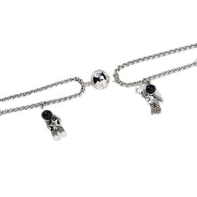 China 2021 Hot Selling Hiphop Vintage Fancy Stainless Steel Link Chain With Space Man Charms Magnetic Couples Necklace For Lovers Wholesale for sale