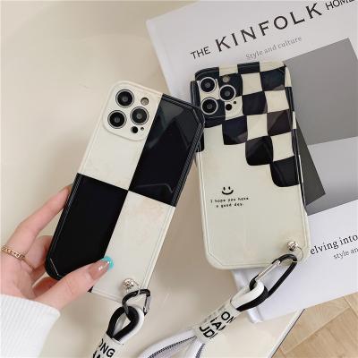 China Black And White Anti-drop Lattice Cell Phone Case With Lanyard For Iphone Max 12pro I Phone 13 Pro Max Case for sale