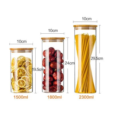 China Large Transparent Glass Storage Bottle with Bamboo Lids LHBG0022 250-500ml for sale