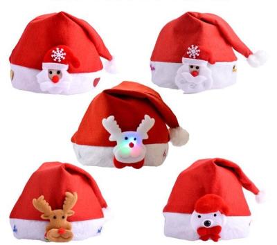 China Christmas decorations Christmas hat belt design decorative pattern non-woven adult luminous Christmas hat children gifts for sale