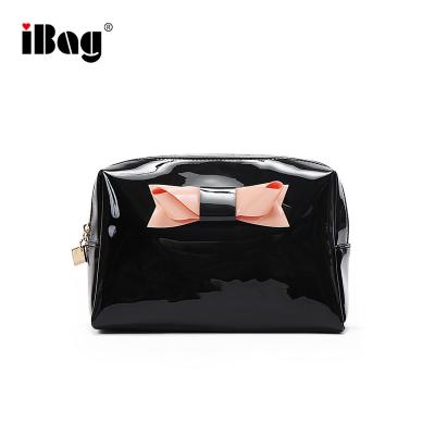 China Simple Style Women Travel PU Leather Bag Cartoon Case Zipper Makeup Bag Cosmetic Handbag With Bow for sale