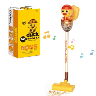 China Pretend Play Amazon Newest Cartoon Duck Learning Electric Handheld Child Vacuum Cleaner Role Play Pretend Game Kids Best Toy for sale