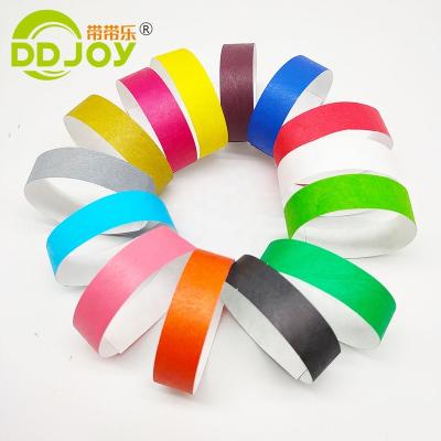 China Custom Cheap Plain Solid Color Tyvek Wrist Band Neon Tyvek Paper Waterproof Disposable Wristband Europe Custom For Events Festival for sale