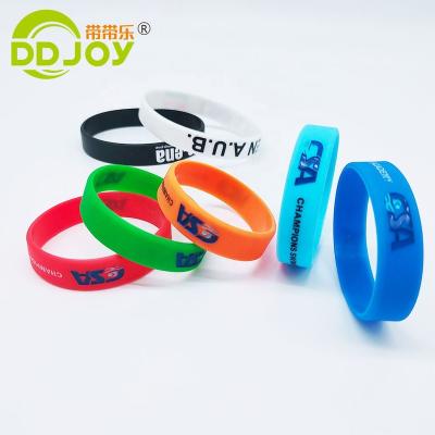 China Hot Sale Cheap Waterproof Glow in the Dark Custom Logo Rubber Silicone Waterproof Wristband Concert Festival Marathon Events Debossed for sale