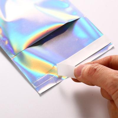 China Moisture Proof Adhesive Self Seal Holographic Laser Courier Packaging Bag for sale