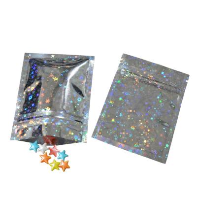 China Moisture Proof Double Sided Laser Star Self Seal Bag Holographic Cosmetics Lipsticks Zip Lock Bag Packaging Bags for sale