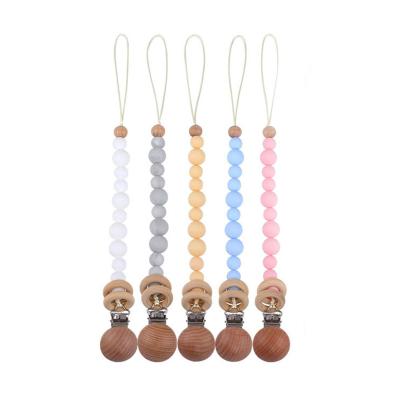 China Wooden Toy Molar Teether Baby Pacifier Clip Silicone Bead PVC Silicone Baby Pacifier Safe Eco-Friendly Chain Free for sale