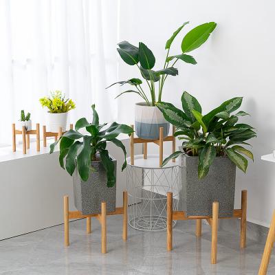 China Modern Adjustable Bamboo Wooden Flower Stand Potted Plant Stand for sale