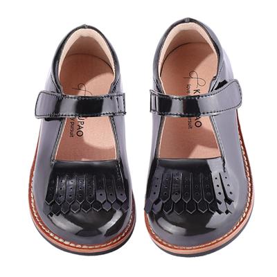 China PU smooth leather school real soled flat kids and girls' stylish hard soled tassel shoes for sale