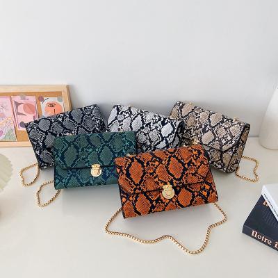 China Fashion Factory Wholesale Ladies Chain Luxury Handbags Snake Purses Lady Hand Bags For Woman for sale