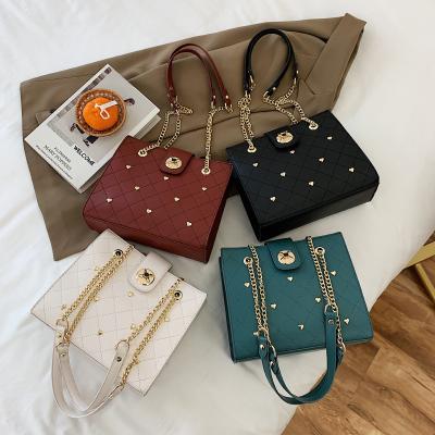 China Fashion Hot Fashionable Rivets Tote Purses Ladies Chain Handbags Popular Girls Messenger Hand Bags for sale