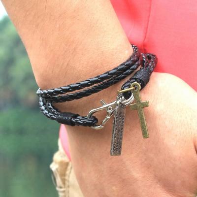 China CLASSIC Classic PU Leather Bracelet Multilayer Hand Knitted Hand Knitted Cross Pendant Bracelet With Single Spring Buckle for sale