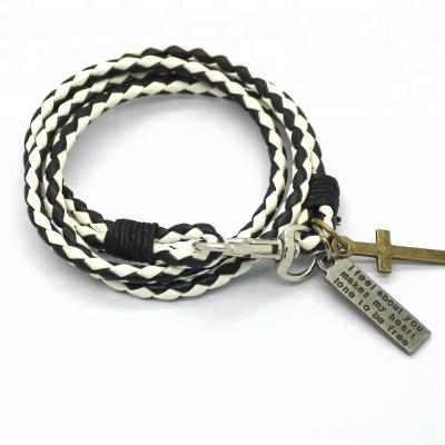 China Fashion Men Women CLASSIC PU Leather Bracelet Cross Pendant Spring Buckle Multilayer Hand Knitted Single Bracelet for sale