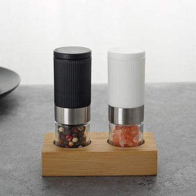 China 25mlx2 Mini Plastic PP 304 Body 18/8 Viable Ring Ceramic Core Salt And Pepper Grinderl Stainless Steel Set With Bamboo Base for sale