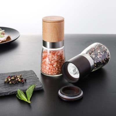 China Sustainable Beech Wood Salt and Pepper Spice Grinder 18/8 Stainless Steel Ceramic Ring Grinder with 140ml Glass Jar for sale