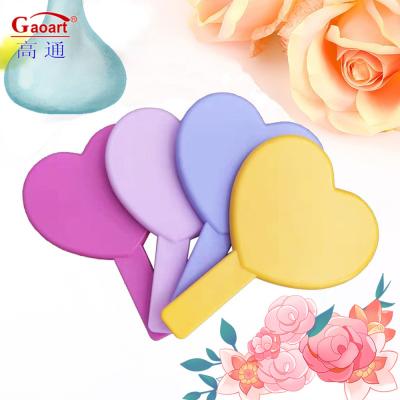 China Small Custom Hand Held Cosmetic Mirror Ideal for Everyday and Occasions for sale