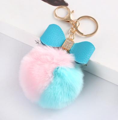 China Cute Low Price Artificial Fur Puff Balls Rabbit Ear Keychains Fluffy Love Accessories Charm Pendant Decoration Pom Pom Ball Keychain for sale