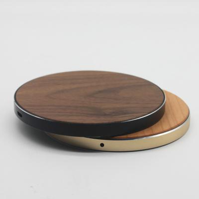 China OEM Logo Round Wood Bamboo Fast Mobile Phone Wooden Wireless Charger for sale