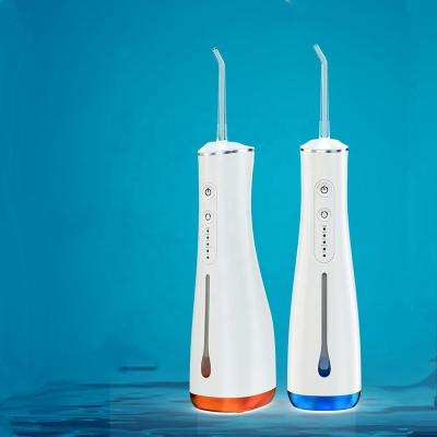 China Teeth Clean and Massager Factory Detachable Tank USB Charging Wireless Portable Electric Dental Flosser Irrigator Fly Cat Oral Water Flosser for sale