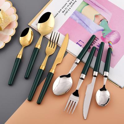 China New 2022 Viable Handle Gold Flatware Metal Fashionable Ceramic Flatware Cutlery With Promotional Flatware Sets for sale