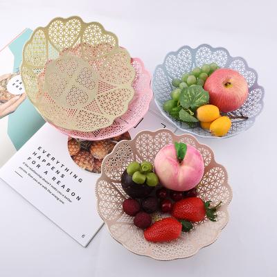 China Stocked candy creative color hollow out lace fruit and vegetable basket candy snack dish dry fruit dish for sale