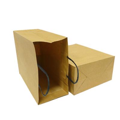 China Recyclable in Brown Gift Kraft Paper Bags Stock Custom Craft Shopping Paper Bag with Paper Handles for sale