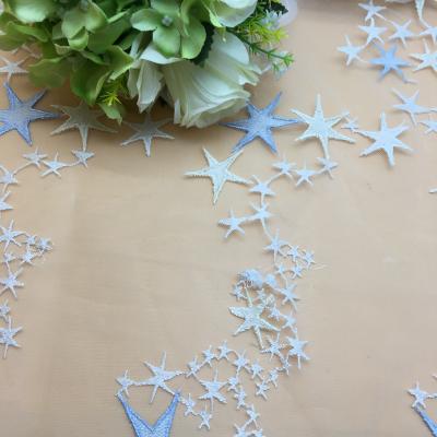 China Anti-Static Starfish Designs 100 Polyester Tulle Dress Mesh Star Lace Fabric For Dress for sale