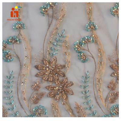 China HLSD180# 2020 viable fashion style lace dress fabric gold rhinestone embroidery fabric for dress for sale