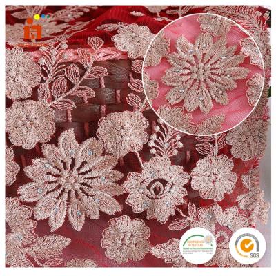 China Viable Promotional Good Quality Swiss Organza Lace Fabric Swiss Gold Gold Lace Fabric Embroidery With Stones for sale