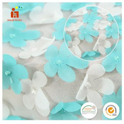 China Shaoxing Textile Fancy Style 3d Flowers Tulle Laser Cut Embroidery Breathable Fabric for sale