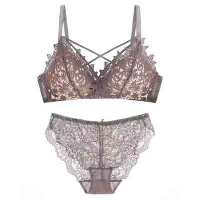 China Custom sexy triangle cup breathable high quality steel ring small breast lace up female lace bra set for sale