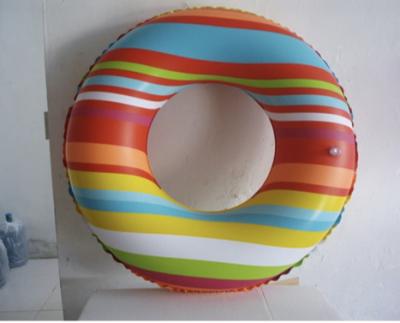 China Women Factory supplier Inflatable Rainbow swimming ring pool ring float for adults for sale