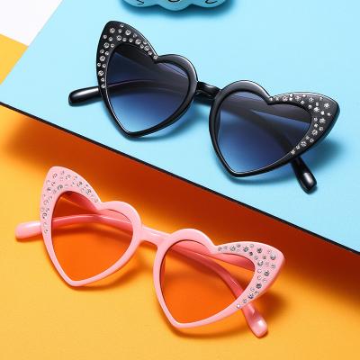 China Fashion Sunglasses Shape Hot Selling Popular Crystal Cute Kids Eyewear Girl Rhinestone Boy Shades Heart Shape Sunglasses for sale