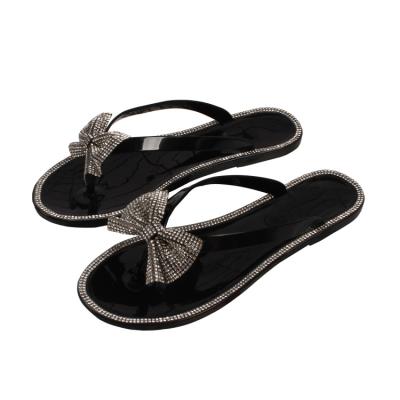 China Ladies Anti-slippery Diamond Slippers Flip Flop Beach PVC Jelly Artificial Slippers for sale