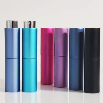 China Personal Care 8ml Empty Twist Up Travel Size Perfume 10ml Aluminum Round Refillable Portable Atomizer for sale