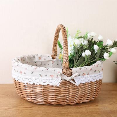 China New Style Picnic Basket Wicker Baskets Sustainable Storage Basket Flower Cosmetic Storage Baskets for sale