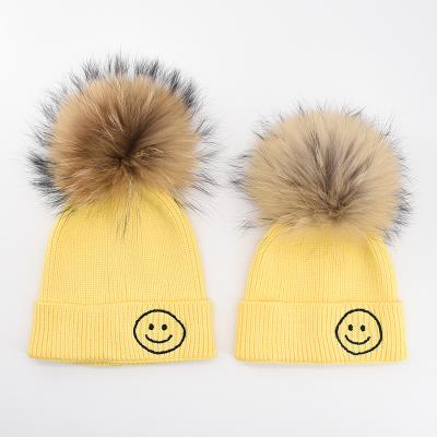 China KAZUFUR Winter Real Raccoon JOINT Warm Ball Top Kids Knit Beanie Mom and Baby Beanie Hats for sale