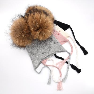 China breathable & KAZUFUR Waterproof Wool Knit Hat With Two Real Fur Pom Poms Beanie Hat For Kids for sale