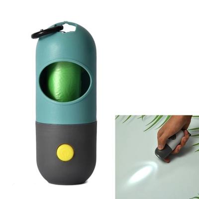 China Stocked Outdoor Pet Supplies Illuminated Flashlight Dog Poop Bag Holder Dispenser Poop Bags Biodegradable for sale