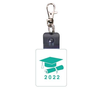 China 2022 Gift Shops Graduation Season Promotion 7 Colors LED Key Chain Custom Brands And Logo For Graduation Gift for sale