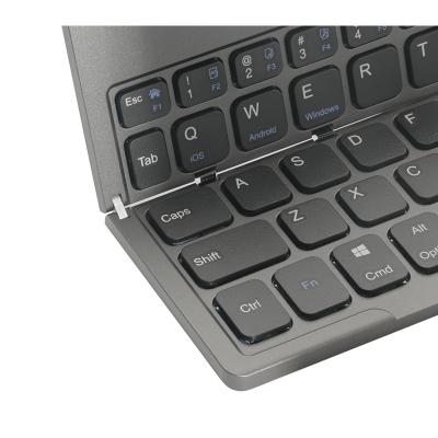 China BTF35 64 Keys Ultra Thin Rechargeable Wireless Folding Portable Keyboard Mini Foldable Wireless Keyboard for sale