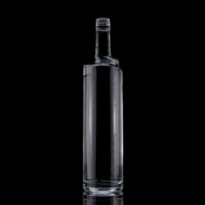 China Liquor mountain road spiral shape in clear mountain road glass bottle 750ml spiral empty whiskey bottle with cap for sale