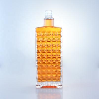 China Vodka Factory Wholesale 750ml Customized Glass Bottle Square Shape Logo Embossed Lid Extra Flint Bottles With for sale