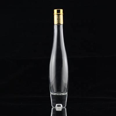 China Gold Cap Wine Vending Bottles Wine 750ml Liquor Glass Alcohol Bottle Based On Heavy Metal Glass for sale